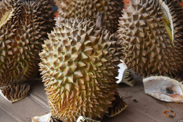 Naklejka na ściany i meble Local durian fruits at the traditional market in Indonesia