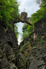 natural rocky bridge in mountains