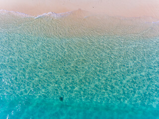 Fototapeta na wymiar An aerial top down view on a wild beach on Curieuse Island in Seychelles