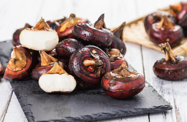 Vegetable water chestnuts on a white background
