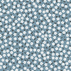 Seamless vintage pattern. Small white flowers, brown leaves. Blue background. vector texture. fashionable print for textiles, wallpaper and packaging.