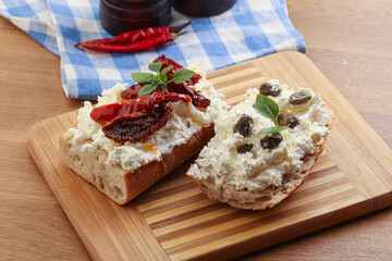 bruschetta with soft cheese capers and tomato
