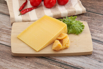 Parmesan hard cheese with small pieces