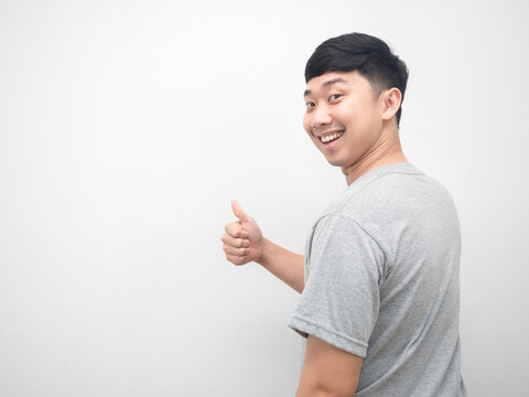 Asian Man Turn Back For Thumb Up With Happy Smile Emotion Copy Space