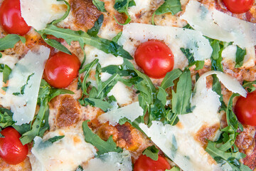 Delicious pizza Caesar style with white sauce, chicken, parmesan, egg, cherry tomatoes and fresh lettuce