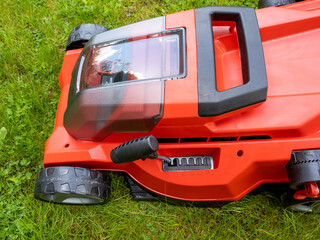 Grass cutting Height adjustable lever on an electric cordless lithium battery powered Lawnmower