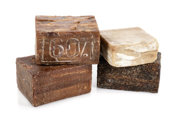 three bars of old natural soap isolated on white