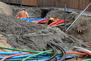 Men at Work for Pipeline Renovation in Amsterdam, Netherlands