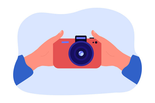 Hands of person holding camera and taking selfie. Front view of photo camera flat vector illustration. Photography, memories, technology concept for banner, website design or landing web page