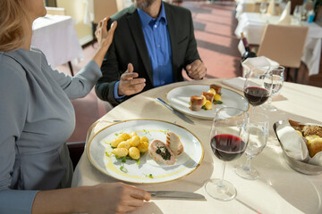 Romantic couple having lunch in the restaurant