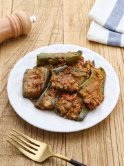 Terong balado, Terong sambal balado or balado eggplant sauce, traditional food from Indonesia. Selective focus image.
