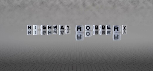 highway robbery word or concept represented by black and white letter cubes on a grey horizon background stretching to infinity