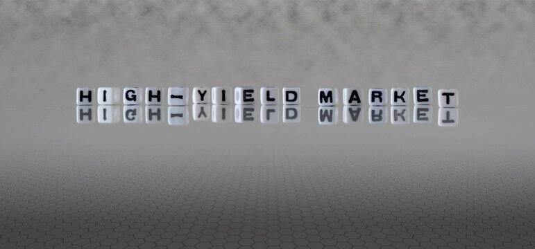 High Yield Market Word Or Concept Represented By Black And White Letter Cubes On A Grey Horizon Background Stretching To Infinity