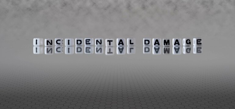 incidental damage word or concept represented by black and white letter cubes on a grey horizon background stretching to infinity