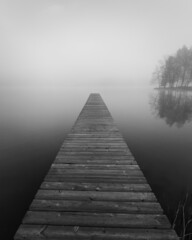 Obraz premium wooden bridge in the fog