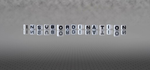 insubordination word or concept represented by black and white letter cubes on a grey horizon background stretching to infinity - obrazy, fototapety, plakaty