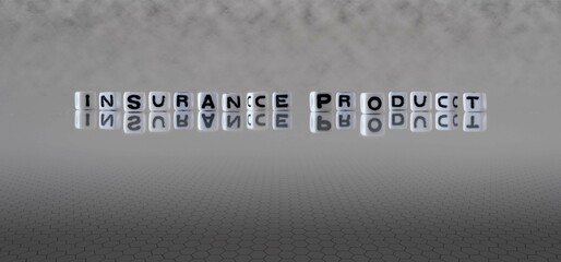 insurance product word or concept represented by black and white letter cubes on a grey horizon background stretching to infinity