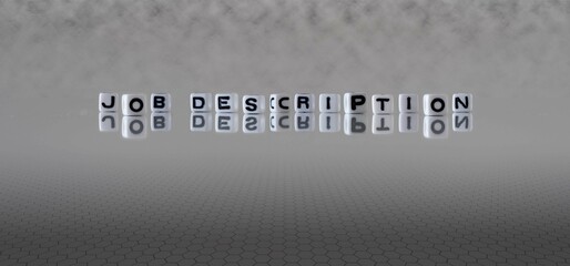 job description word or concept represented by black and white letter cubes on a grey horizon...