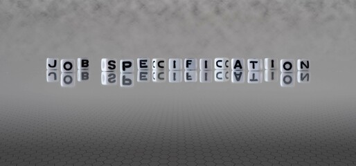 job specification word or concept represented by black and white letter cubes on a grey horizon...