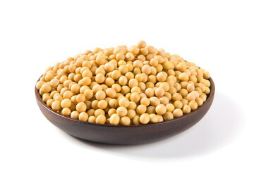 Soybean seeds in wooden plate isolated on white background