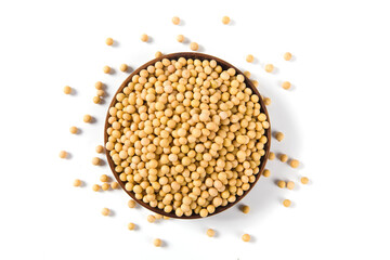 Soybean seeds in wooden plate isolated on white background