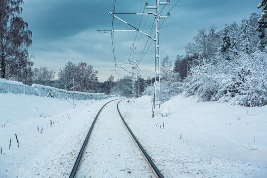 Railway in winter landscape in south Sweden