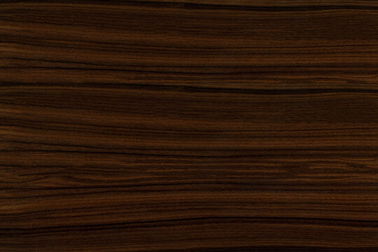 Dark brown bookmatched walnut wood texture