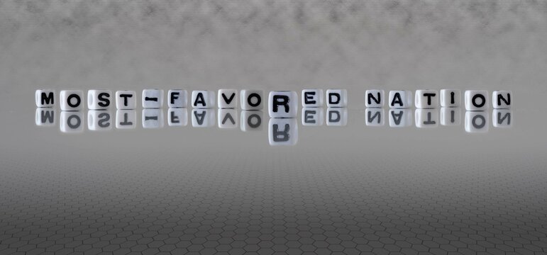 most favored nation word or concept represented by black and white letter cubes on a grey horizon background stretching to infinity