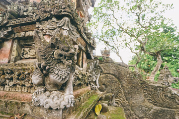 Sculpture and religion. Traditional hindu statue of demon at Bali temple.