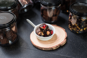 Homemade Brownies served on black table at cafe​