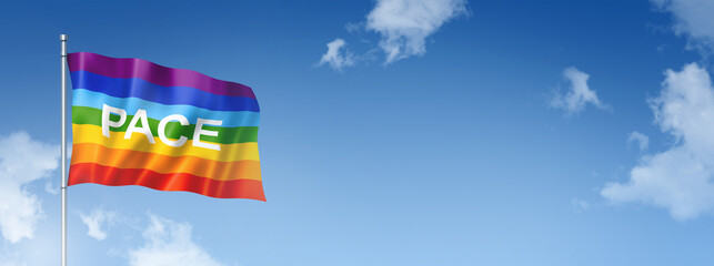Rainbow peace / pace flag isolated on a blue sky. Horizontal banner