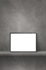 Digital tablet pc on grey wall shelf. Vertical background banner