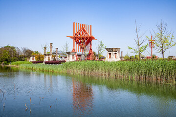 Red special buildings and rivers in Jinshan Park Square of Jinshan Temple in Zhenjiang