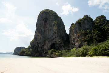 Landscape Traveller on Railay Phranang Beach  white sand and blue sea with limestone in Railay Ao...