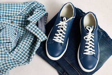 Fashionable suede sneakers. Sport shoes. Expensive footwear or loafers isolated on white background...