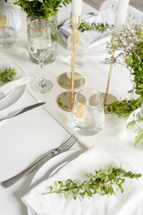 The wedding decor. Wedding table decoration with white roses