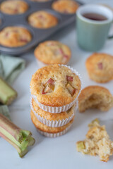 home made almond rhubarb muffins on a table
