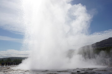 Water exploding in geysir, Iceland. 