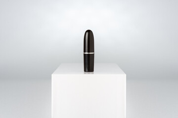 Mockup with pure black lipstick on a pedestal