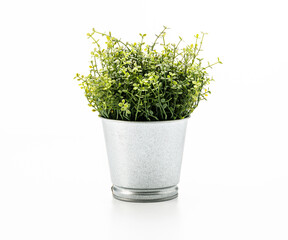 Artificial plant in metal pot