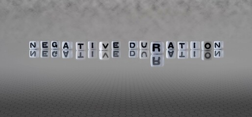 negative duration word or concept represented by black and white letter cubes on a grey horizon...