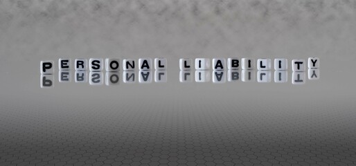 personal liability word or concept represented by black and white letter cubes on a grey horizon...