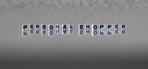personal shopper word or concept represented by black and white letter cubes on a grey horizon background stretching to infinity