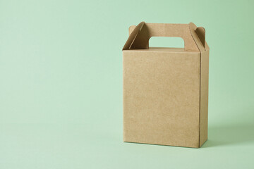 Kraft cardboard box with a handle for packaging
