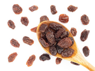 Raisin in spoon and bunch isolated on white background. Macro. Vegetarian concept