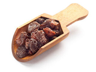 Raisin in wooden scoop isolated on white background. Macro. Vegetarian concept