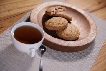 berry tea and a decorative wooden plate is very beautiful for vegetables and cookies, sweets and desserts as an element of decor for interior design