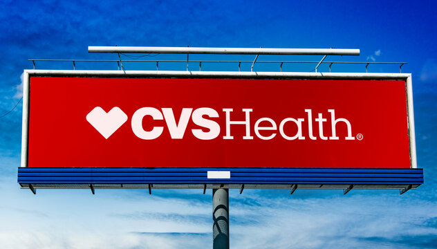 Advertisement billboard displaying logo of CVS Health Corp.
