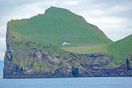 Lonely house on the Island ellidaey of the Vestmannaeyjar archipelago. Iceland