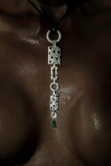 Diamond pendant on black skin